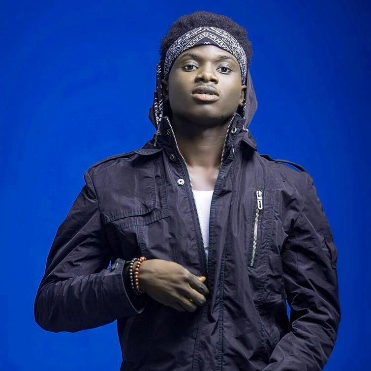 Kuami Eugene Is Out In The Rains preaching the gospel (video)