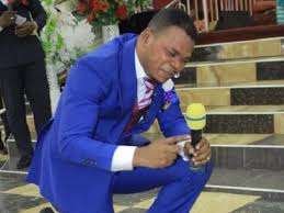 Obinim rolls on the floor after church member won 300k cedis lottery cash