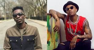 Shatta Wale trolled for bowing down for Wizkid like a servant & his is master (Screenshots)